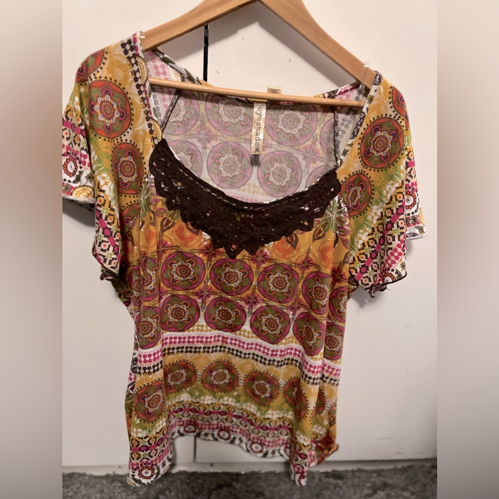 Women’s shirt size 2x. No rips or holes
